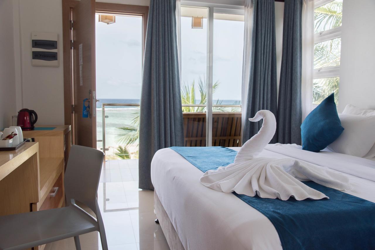 Reef Edge Thulusdhoo, Maldives Exterior foto